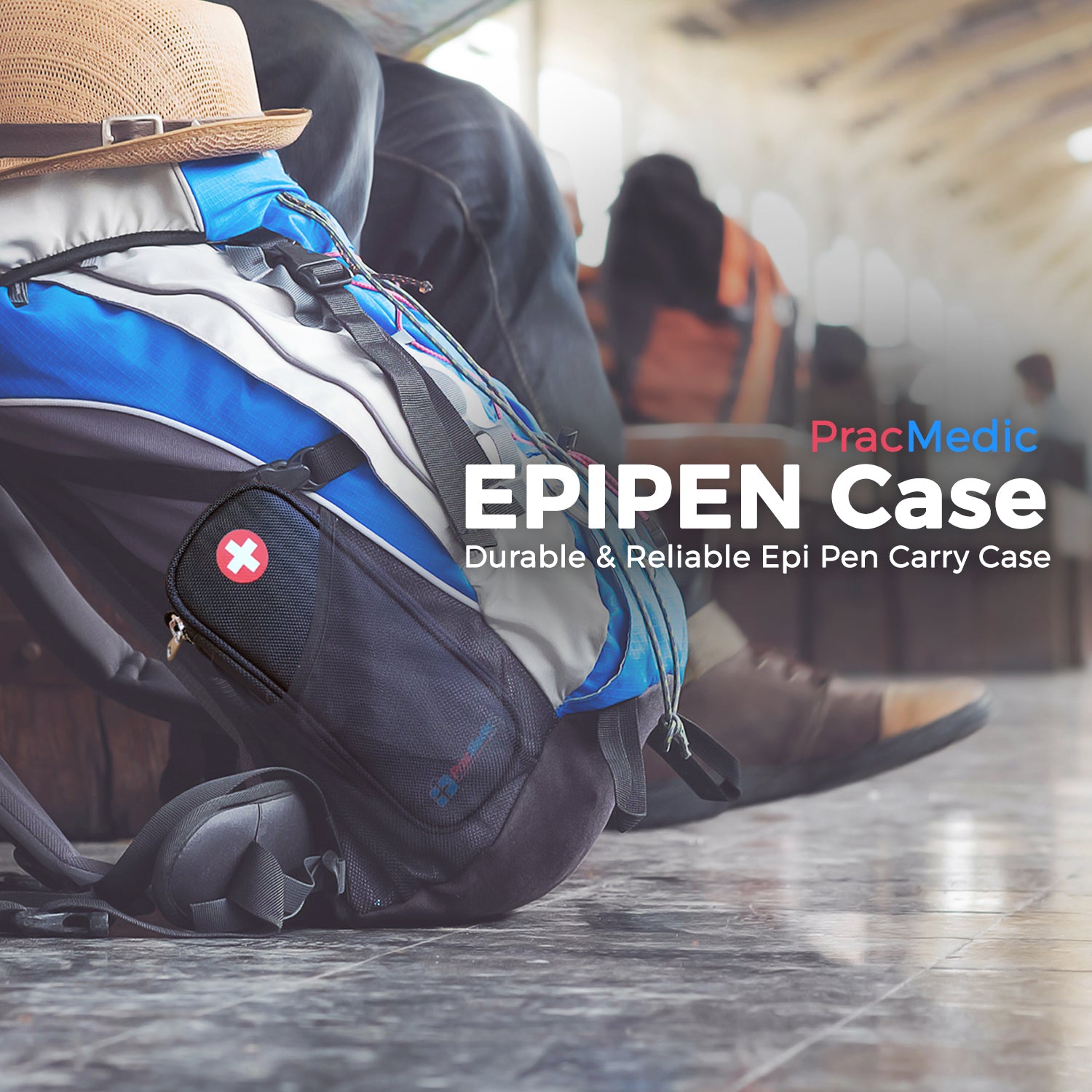 PracMedic Bags black EpiPen carry case with red medical cross symbol attached to blue hiking backpack at an airport, designed for safe travel medication storage